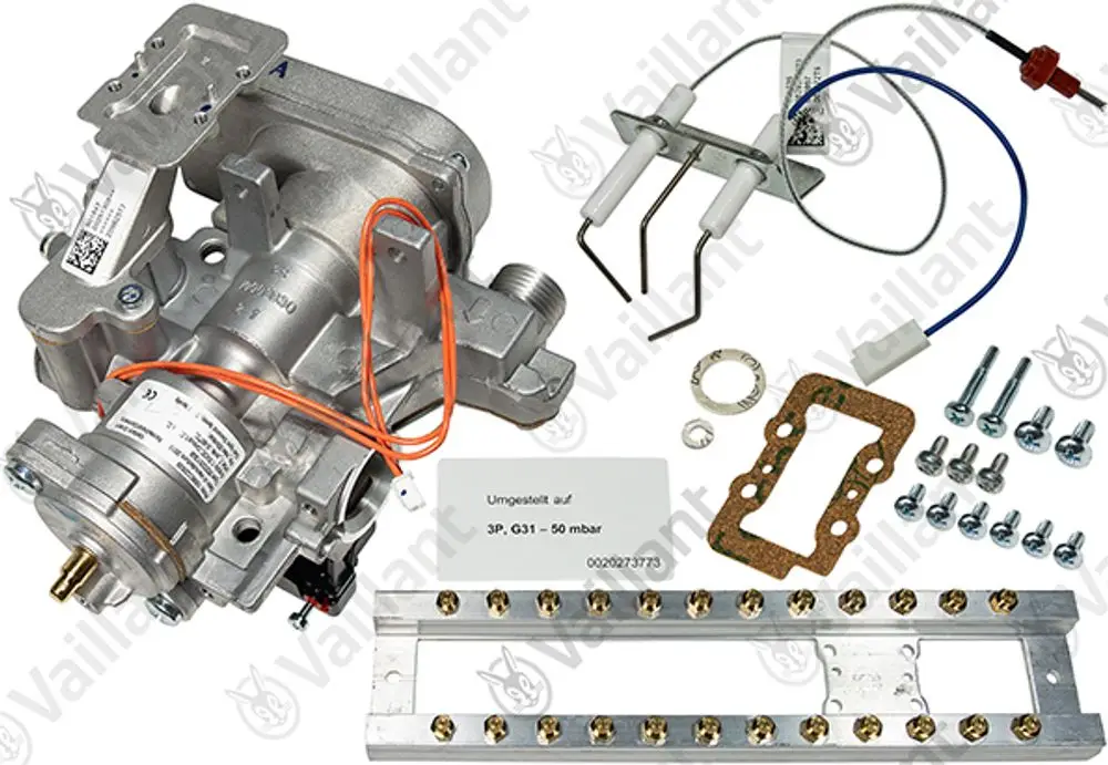 Vaillant Umstellsatz mit verschiedenen Bauteilen, darunter ein Gasregelgerät, Zündelektroden, Dichtungsring und Schrauben, in einem klaren Zusammenbau.